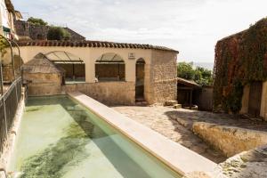 Bazén v ubytování De Felipe Casa Rural nebo v jeho okolí