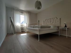 Postel nebo postele na pokoji v ubytování An der Wassermühle
