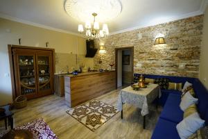 Posezení v ubytování Hotel Daisy S Home
