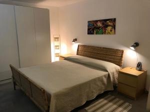 Llit o llits en una habitació de Villa Le Lanterne Pool & Relax