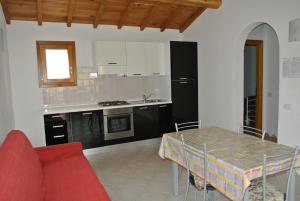 A kitchen or kitchenette at Residence Le Zagare