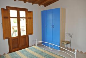 A bed or beds in a room at Residence Le Zagare