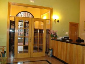 A kitchen or kitchenette at Hostal Universal