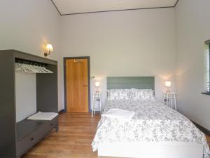 Кровать или кровати в номере Bluebell