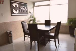 Posezení v ubytování Hotel Niza Zona Piel
