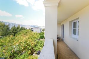A balcony or terrace at Disneyland Dream 3 - Charmant Appartement 7 pax
