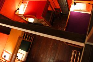 an overhead view of a building with red lights at KACLLA, The Healing Dog Hostel in Lima