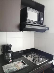 Una cocina o zona de cocina en apartaestudio Medellín Belén