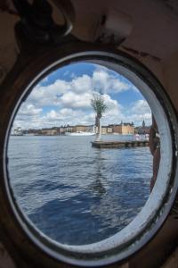 a view of a body of water from a boat at Den Röda Båten in Stockholm