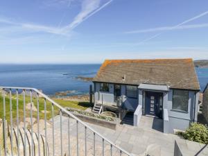 a house with a view of the ocean at Mordros in Penzance