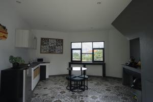 Kuchyň nebo kuchyňský kout v ubytování Vande Guest House
