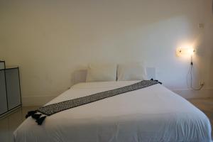 Postel nebo postele na pokoji v ubytování Vande Guest House