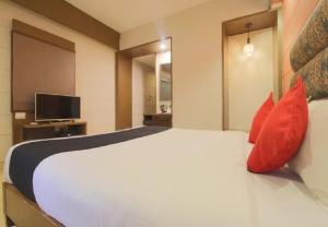 TV a/nebo společenská místnost v ubytování Tangerine Boutique Resort