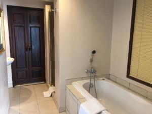 
A bathroom at The Siam Heritage Hotel - SHA Extra Plus
