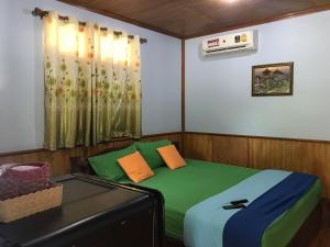 Baan Suan Sukjai Resort 객실 침대