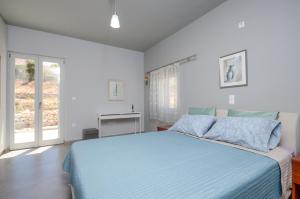 Ένα ή περισσότερα κρεβάτια σε δωμάτιο στο Sunshine villa
