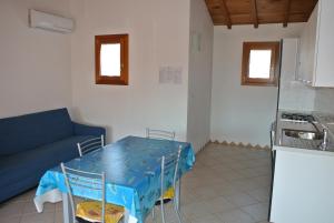 A kitchen or kitchenette at Residence Le Zagare