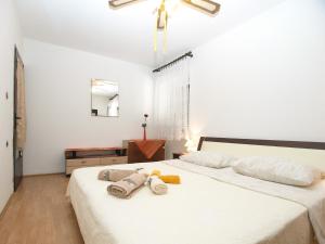 Łóżko lub łóżka w pokoju w obiekcie Apartment Vodnjan 1123