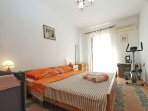Łóżko lub łóżka w pokoju w obiekcie Apartment Vodnjan 1123