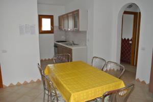 A kitchen or kitchenette at Residence Le Zagare