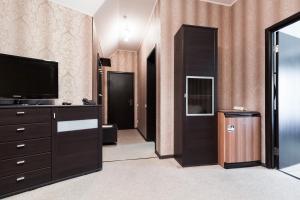 Kuchyň nebo kuchyňský kout v ubytování Noy Hotel