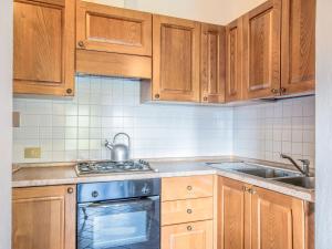 Kuchyň nebo kuchyňský kout v ubytování Apartment Montereggi-4 by Interhome