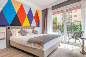 Postel nebo postele na pokoji v ubytování Aparthotel Adagio Rome Vatican