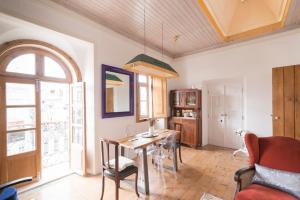 Uma área de estar em Bohemian Antique Guesthouse