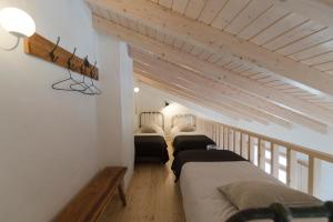 Cama ou camas em um quarto em Bohemian Antique Guesthouse