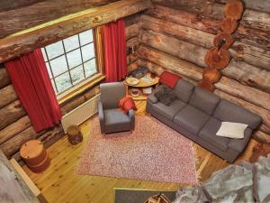 an overhead view of a living room in a log cabin at Holiday Home Luostonseita 3 by Interhome in Luosto