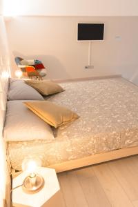 Кровать или кровати в номере Le Cementhine