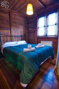 A bed or beds in a room at Panoramic Xalet la Molina con Vistas Excelentes Még 37 kép