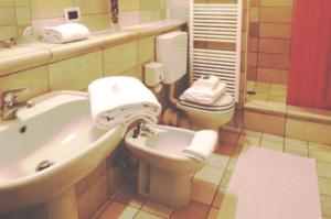 Koupelna v ubytování Corte Posta B&B - parcheggio e bagno in camera