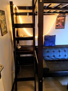 Postel nebo postele na pokoji v ubytování Mini Studio de 13 m2 avec terrasse 15 mn centre Nimes