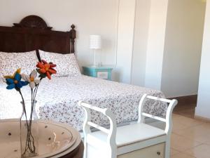 Postel nebo postele na pokoji v ubytování CASA VIDAL RELAX AL PIE DE LA SIERRA
