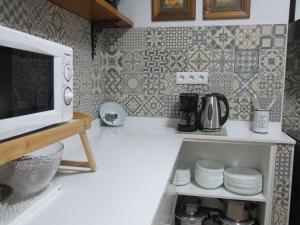 Kuchyň nebo kuchyňský kout v ubytování CASA VIDAL RELAX AL PIE DE LA SIERRA