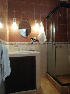 Un baño de El Hotel de Su Merced