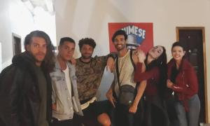 a group of people posing for a picture at Casa Mafer Lodge in Montañita