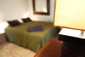 Postel nebo postele na pokoji v ubytování Casa Argentera