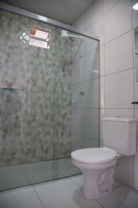Ванна кімната в Suítes Soure
