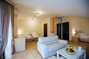 Postel nebo postele na pokoji v ubytování Hotel Sofia + 37 fotografií