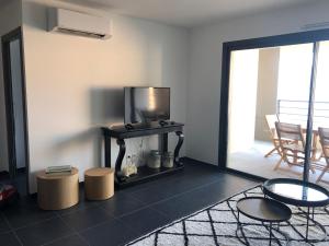 Posezení v ubytování T3 vue mer + 19 fotografií