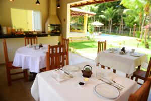 Reštaurácia alebo iné gastronomické zariadenie v ubytovaní Quintas do Arraial Guest House
