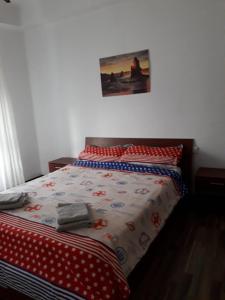 Postel nebo postele na pokoji v ubytování Torrenostra Apartment
