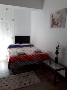 Postel nebo postele na pokoji v ubytování Torrenostra Apartment