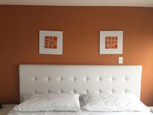 Postel nebo postele na pokoji v ubytování Hotel Garden City Boutique
