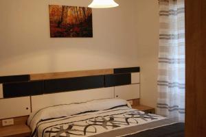 Postel nebo postele na pokoji v ubytování Apartamentos Zabalarena Ola