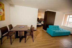 Predel za sedenje v nastanitvi Hotel Dann Cali