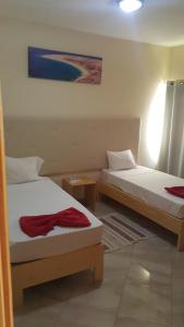 Ein Bett oder Betten in einem Zimmer der Unterkunft IMOBITUR Apartamentos - Palmarejo Baixo