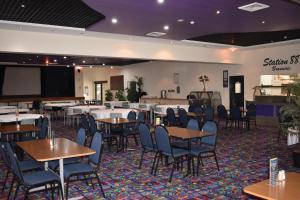 a dining room filled with tables and chairs at Best Western Quirindi RSL Motel in Quirindi